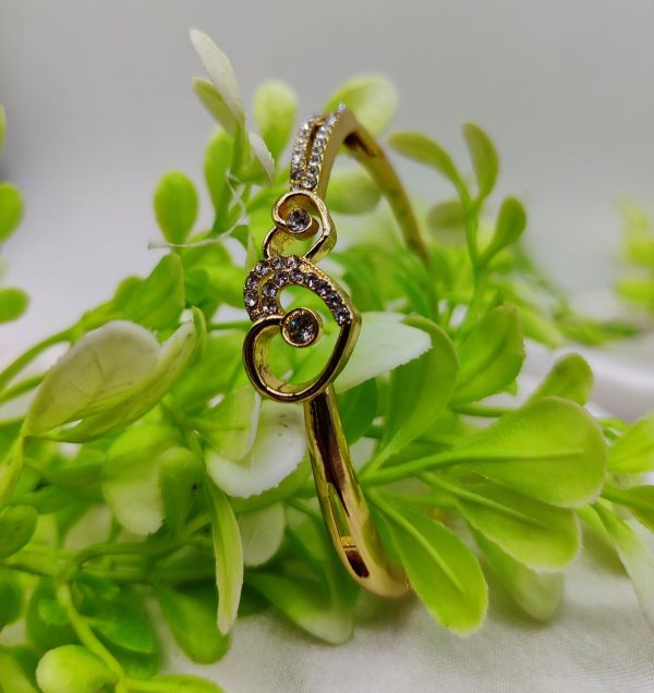 Imported adjustable infinity bracelet with sparkling crystals and elegant design