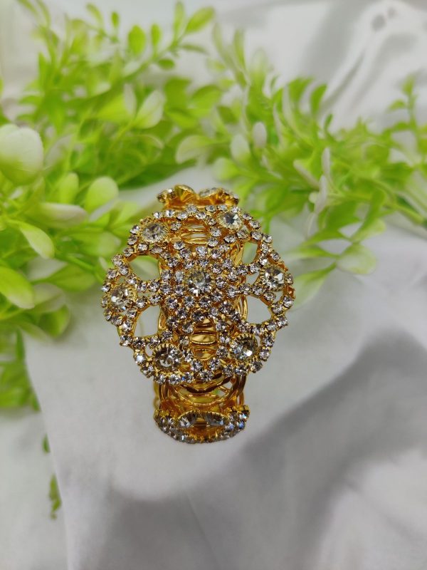 Golden lace crystal bracelet with adjustable fit and intricate design