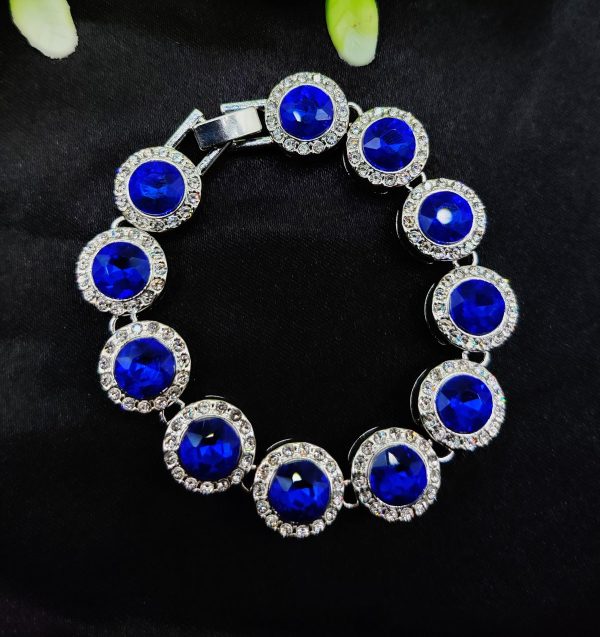 Imported bracelet with royal blue crystals and adjustable silver design