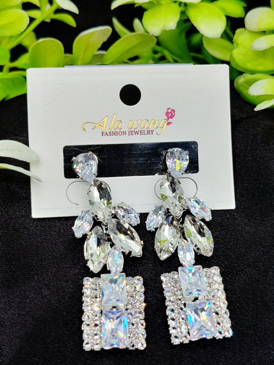 Radiant Crystal Cascade Earrings – A Symphony of Elegance
