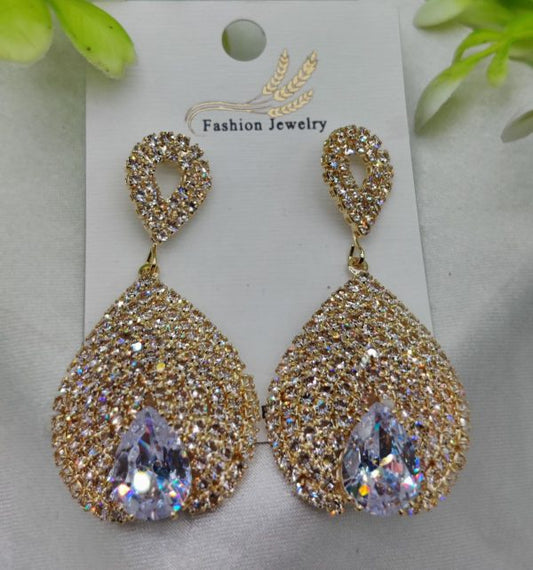 Luxurious teardrop crystal earrings with gold finish and pave detailing for women