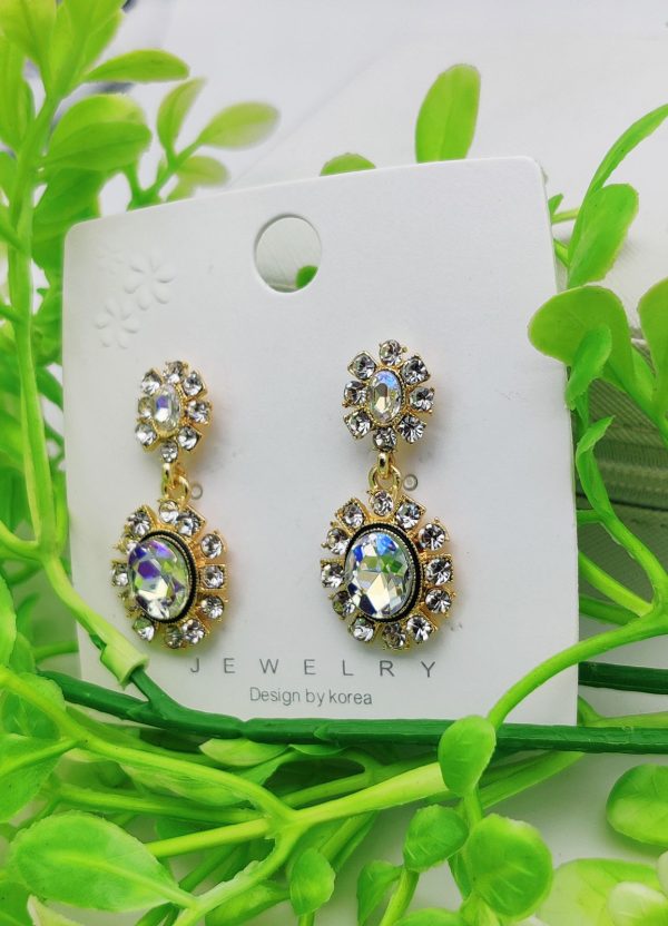 Elegant crystal-embedded dangling earrings with sparkling stones – perfect for formal or casual wear
