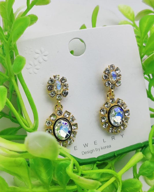 Elegant crystal-embedded dangling earrings with sparkling stones – perfect for formal or casual wear