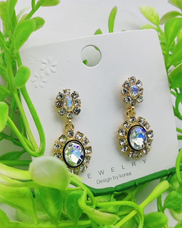Elegant crystal-embedded dangling earrings with sparkling stones – perfect for formal or casual wear