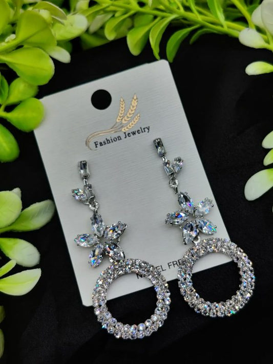 Crystal drop earrings with flower stud and circular crystal drop