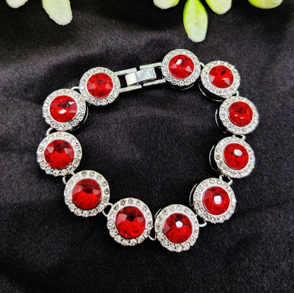 Imported heart bracelet with red accents and adjustable strap