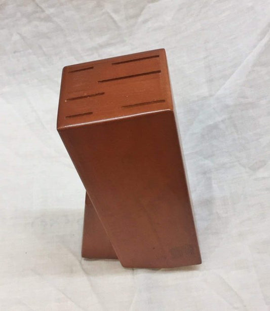 Wooden knife stand organizer for kitchen with vertical knife slots and compact design
