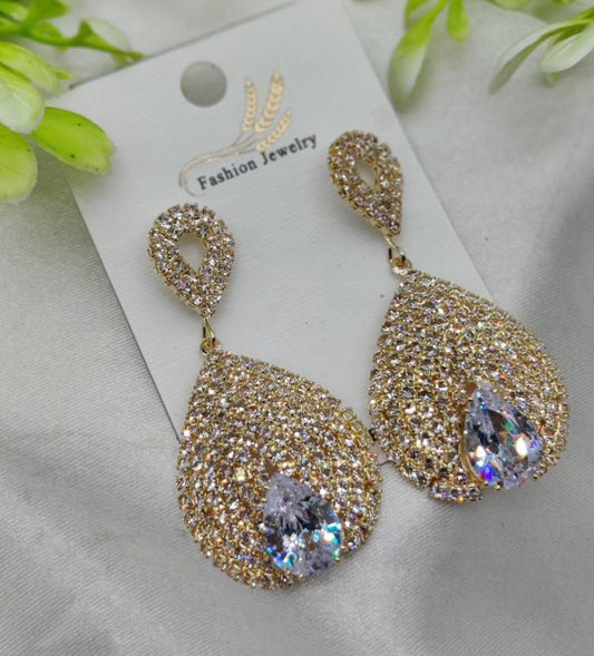 Luxurious teardrop crystal earrings with gold finish and pave detailing for women