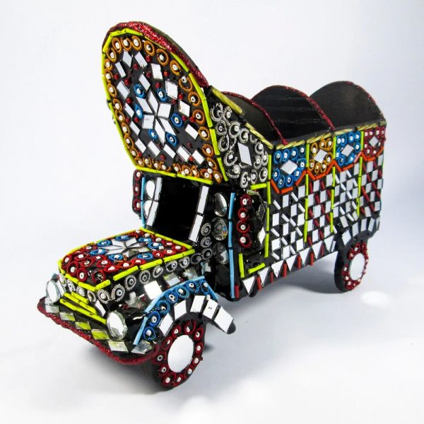 <h2>Mini Truck Colorful Model for Home & Office Decor</h2>
<p>Add a touch of traditional Pakistani craftsmanship to your home or office with this beautifully <strong>handcrafted miniature truck</strong>. Designed with intricate <strong>mirror work and glass accents</strong>, this decorative truck art piece is a vibrant representation of Pakistan’s cultural heritage.</p>

<h3>Original Video of Product</h3>
<div style="text-align:center;">
  <iframe width="560" height="315" src="https://www.youtube.com/embed/